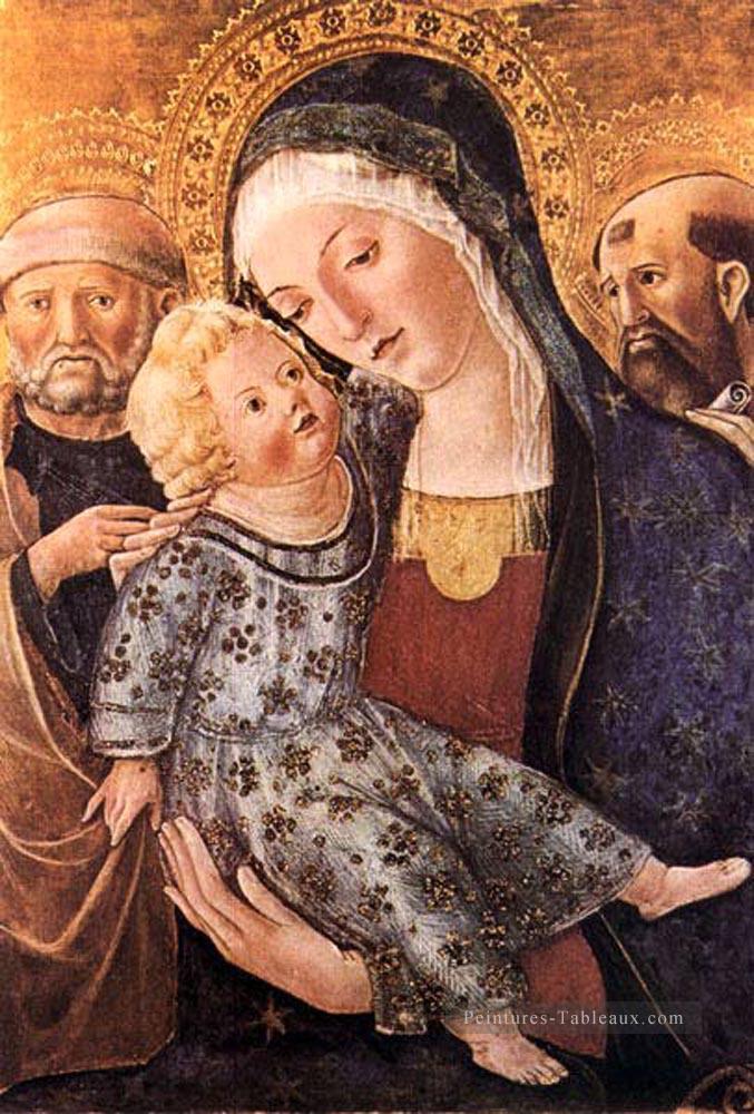 Madone avec enfant et deux saints siennois Francesco di Giorgio Peintures à l'huile